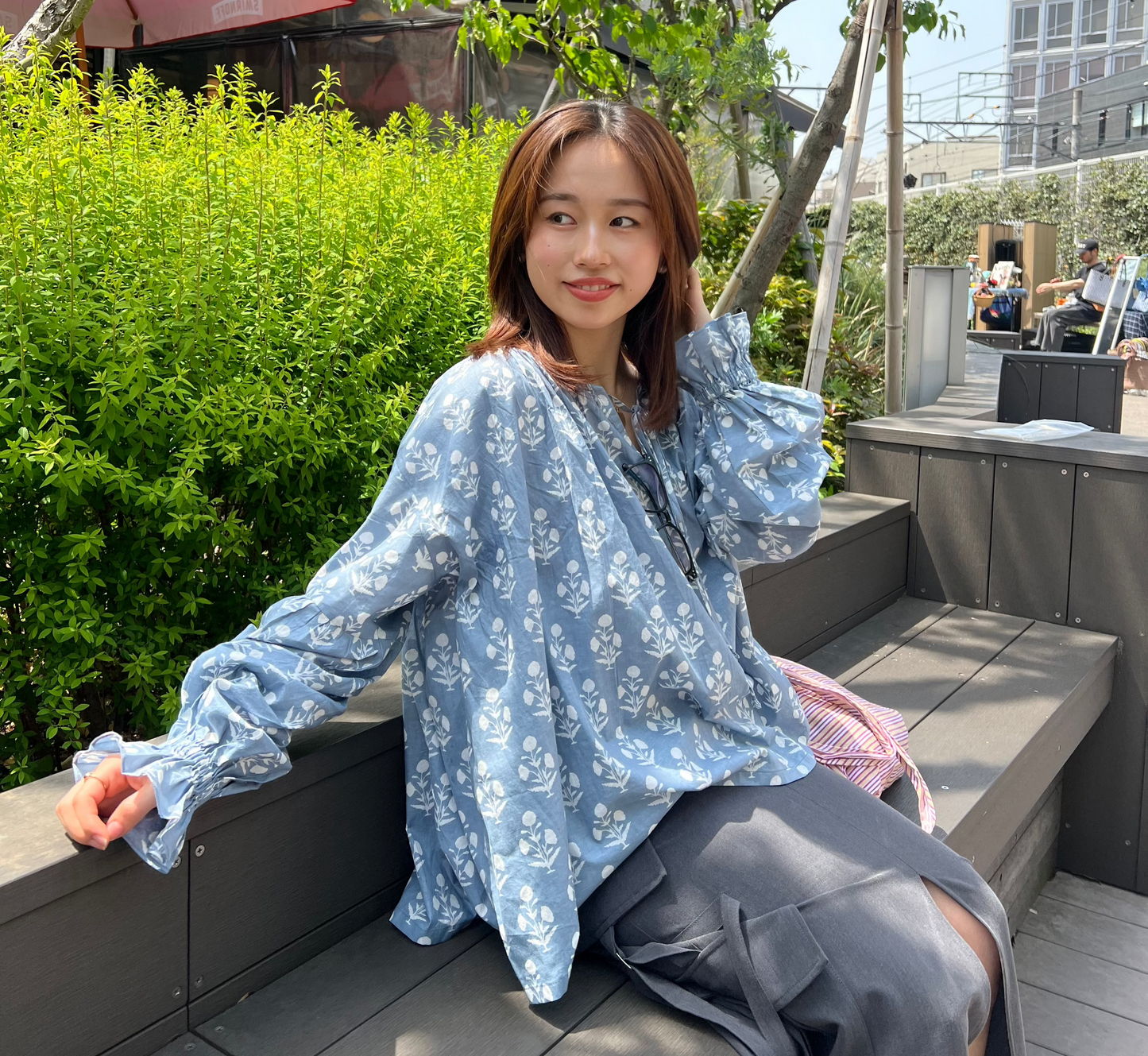 cotton top with a lot of flare and ruffled sleeves in a blue-grey print