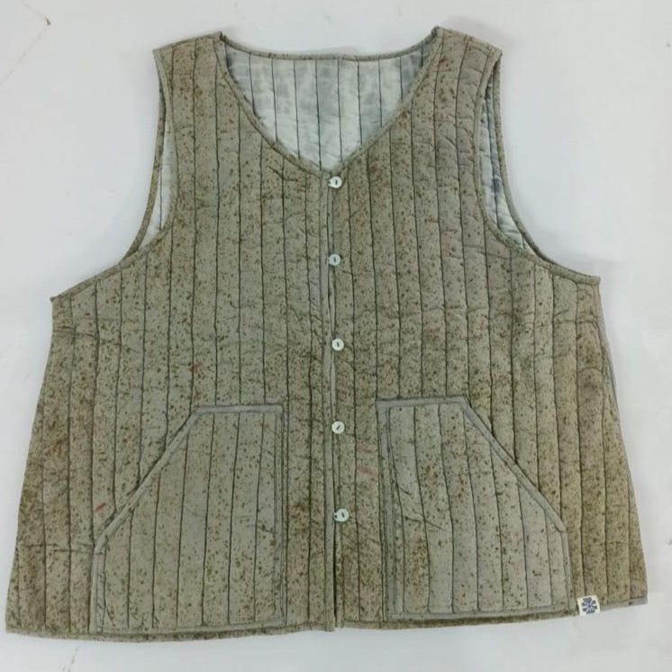grey reversible sleeveless quilted jacket with natural dye shibori