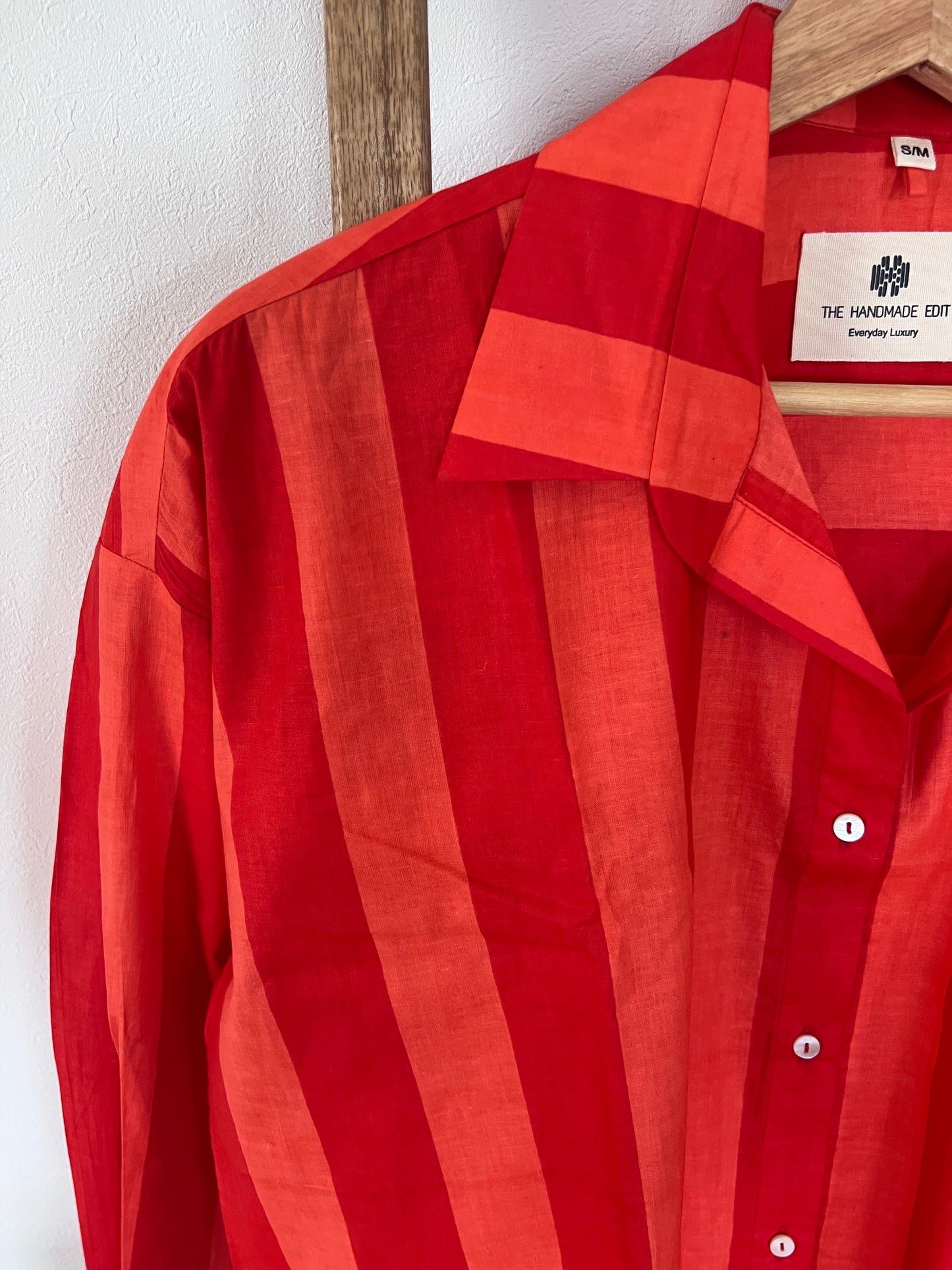 A oversized fit cotton shirt in broad orange and peach stripes