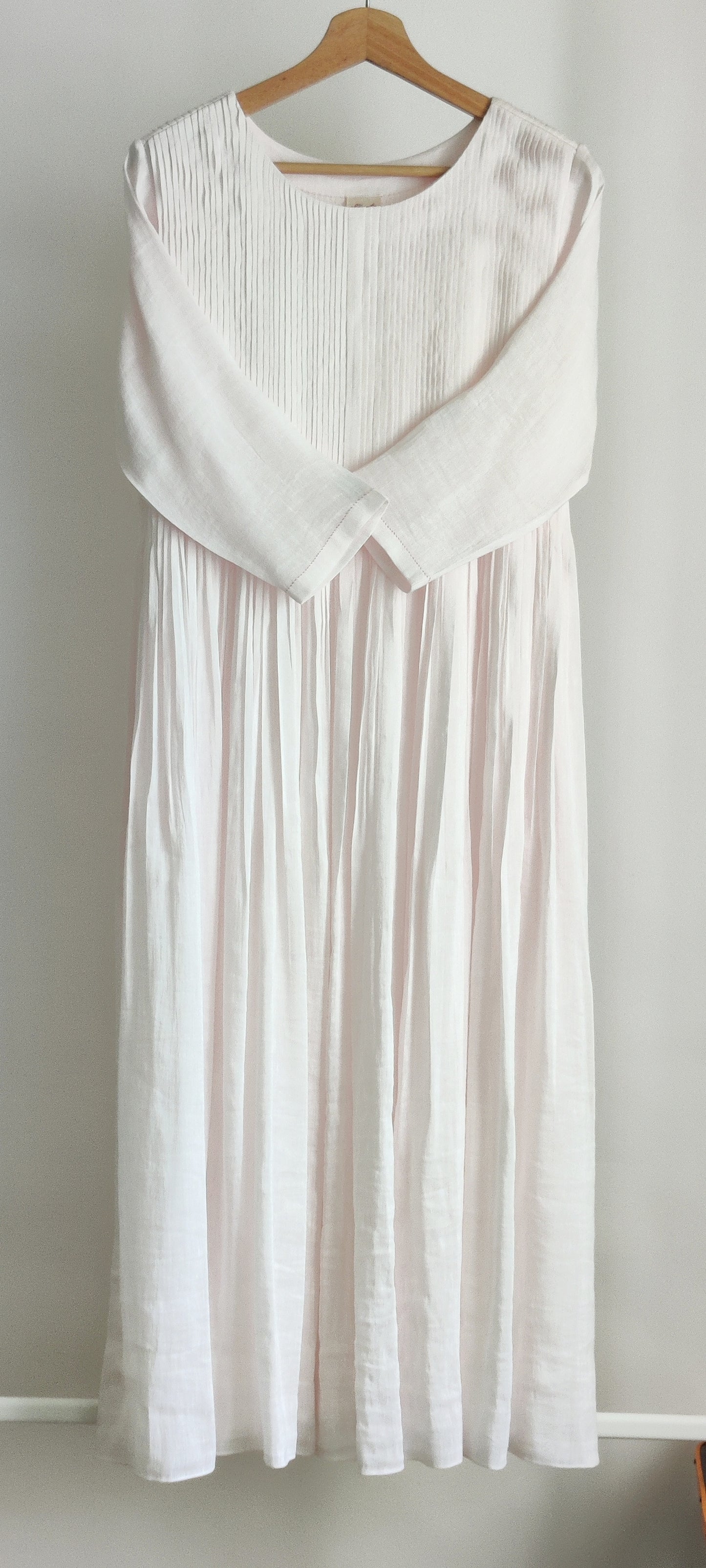 Delicate pink pintucks dress with sleeves