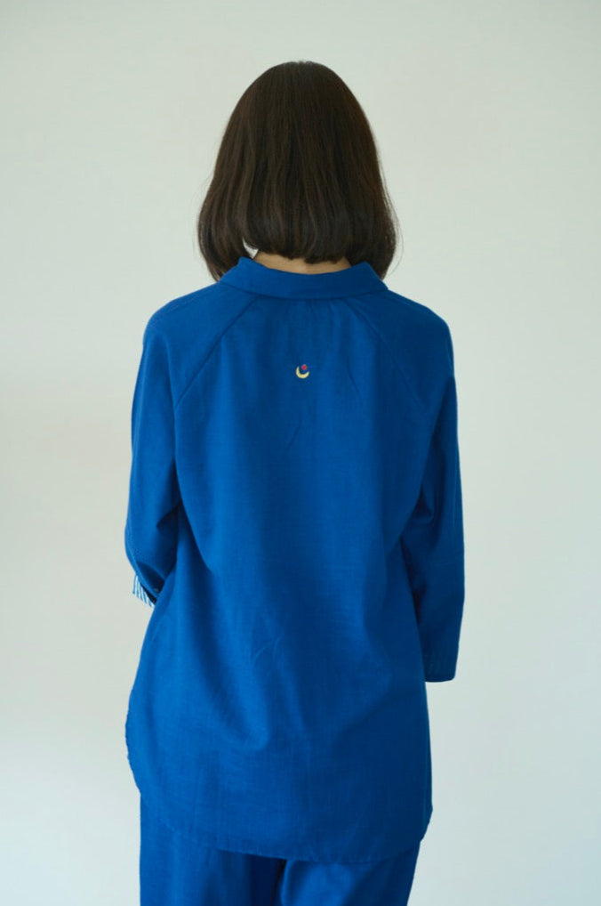 A setup made with blue cotton with collared shirt and half elasticated pants in a deep shade of blue