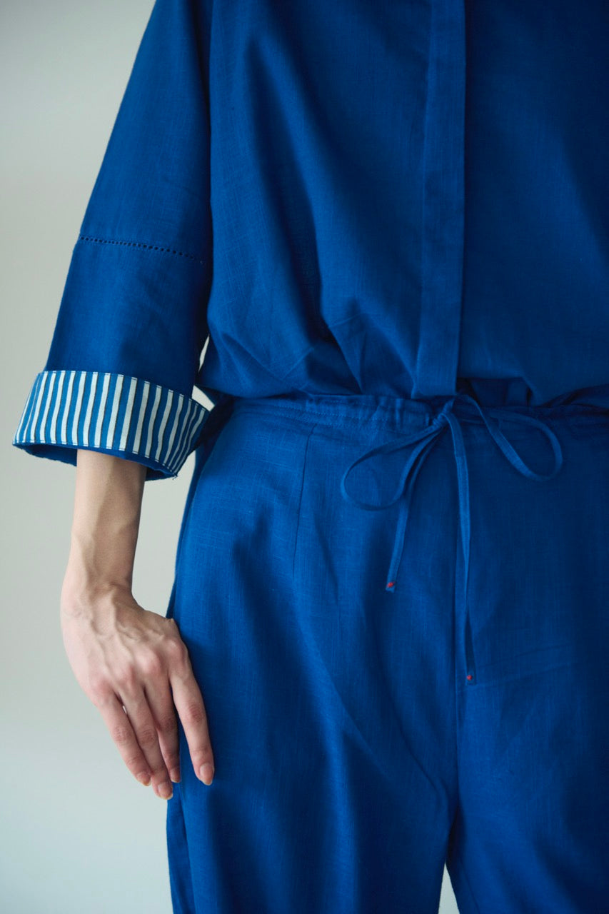 A setup made with blue cotton with collared shirt and half elasticated pants in a deep shade of blue