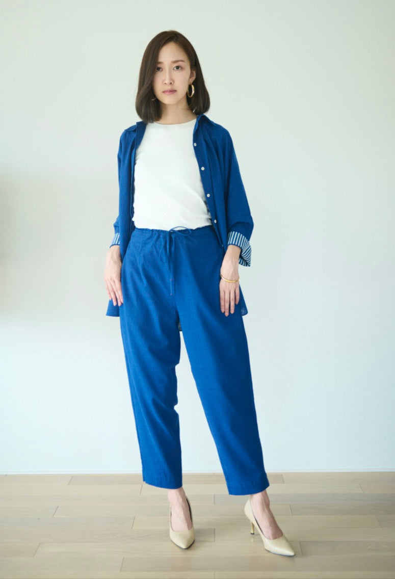 A setup made with blue cotton with collared shirt and half elasticated pants in a deep shade of blue