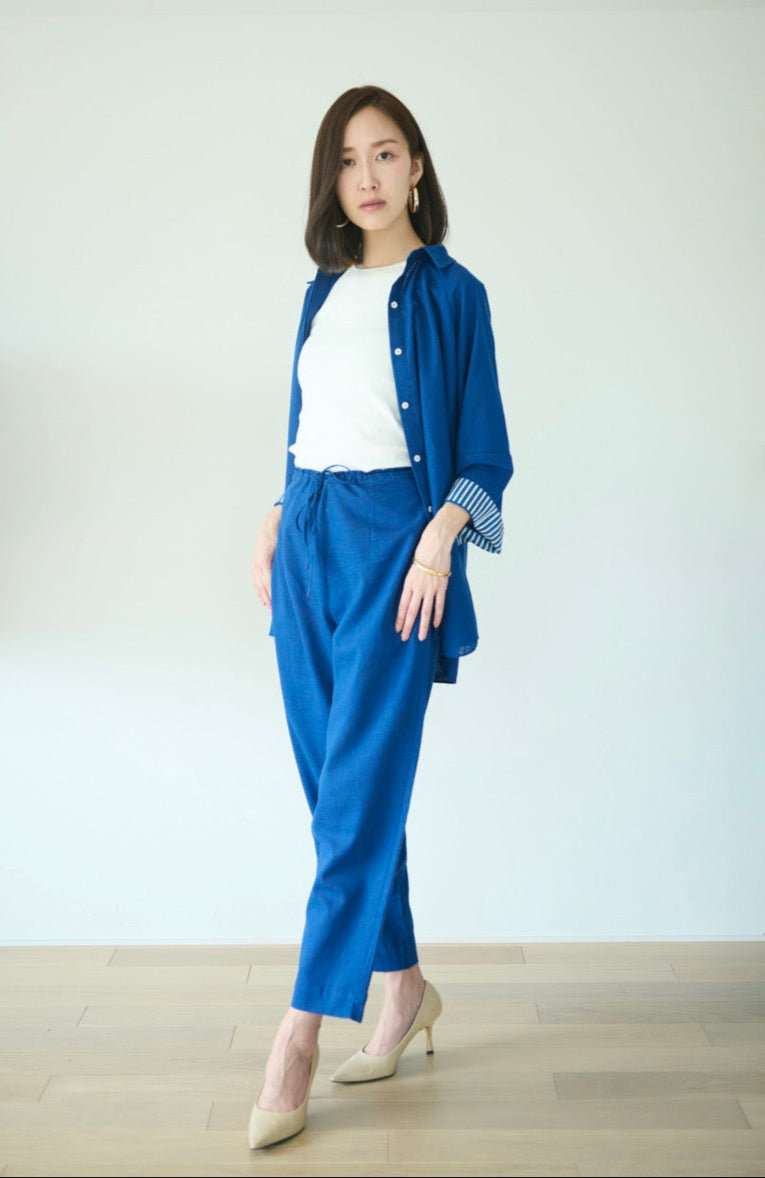 A setup made with blue cotton with collared shirt and half elasticated pants in a deep shade of blue