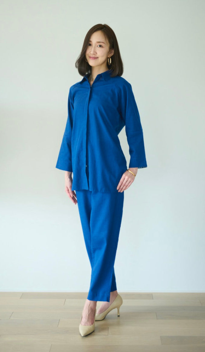 A setup made with blue cotton with collared shirt and half elasticated pants in a deep shade of blue