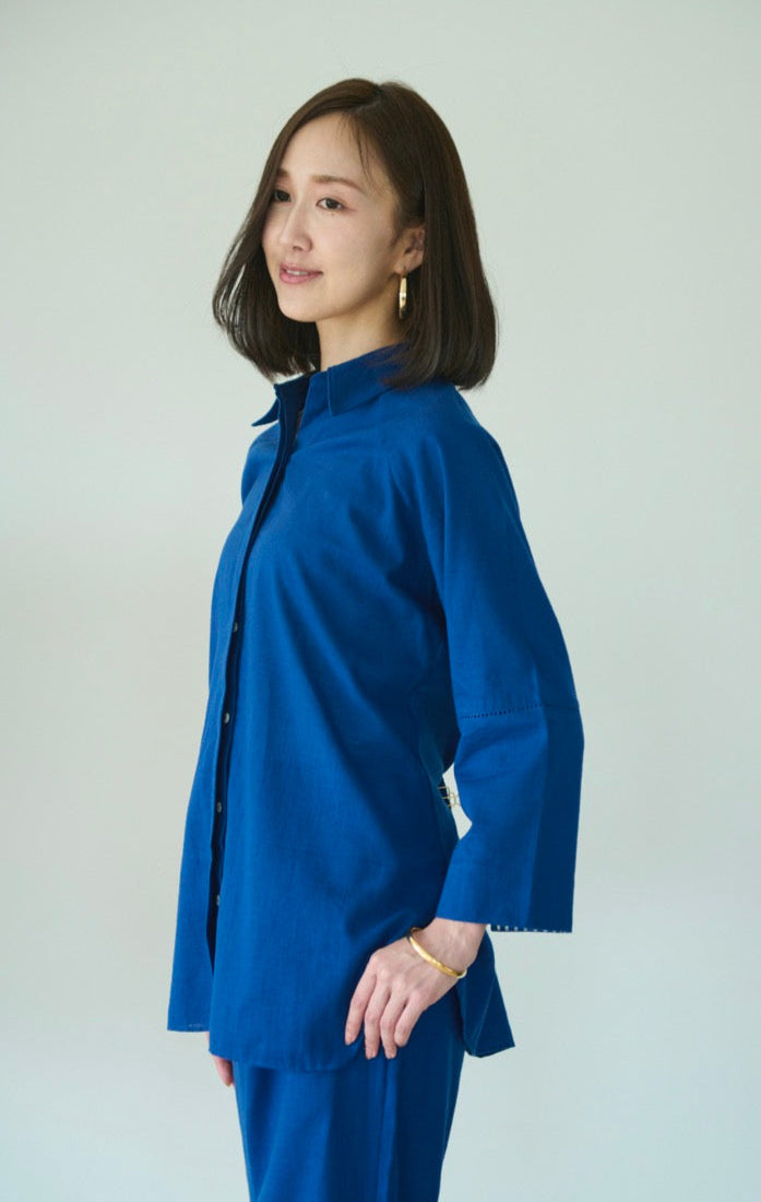 A setup made with blue cotton with collared shirt and half elasticated pants in a deep shade of blue