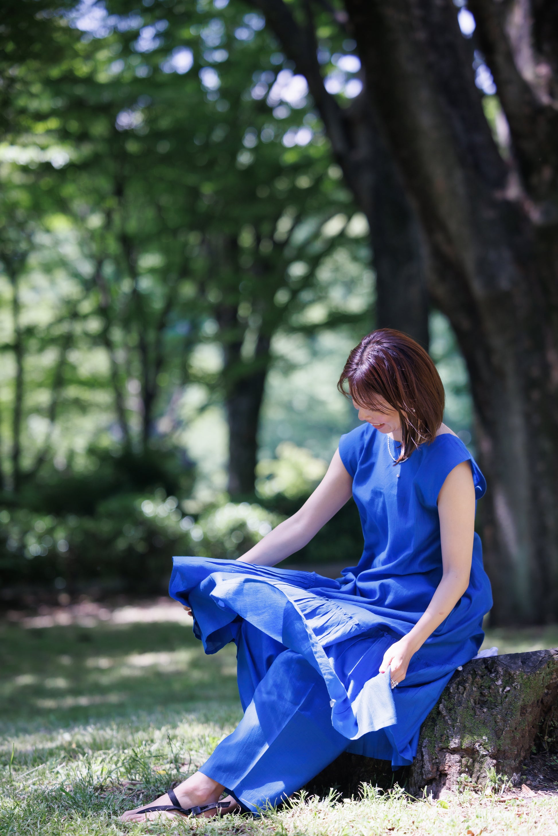 bright blue shift dress with tier hem and scoop back
