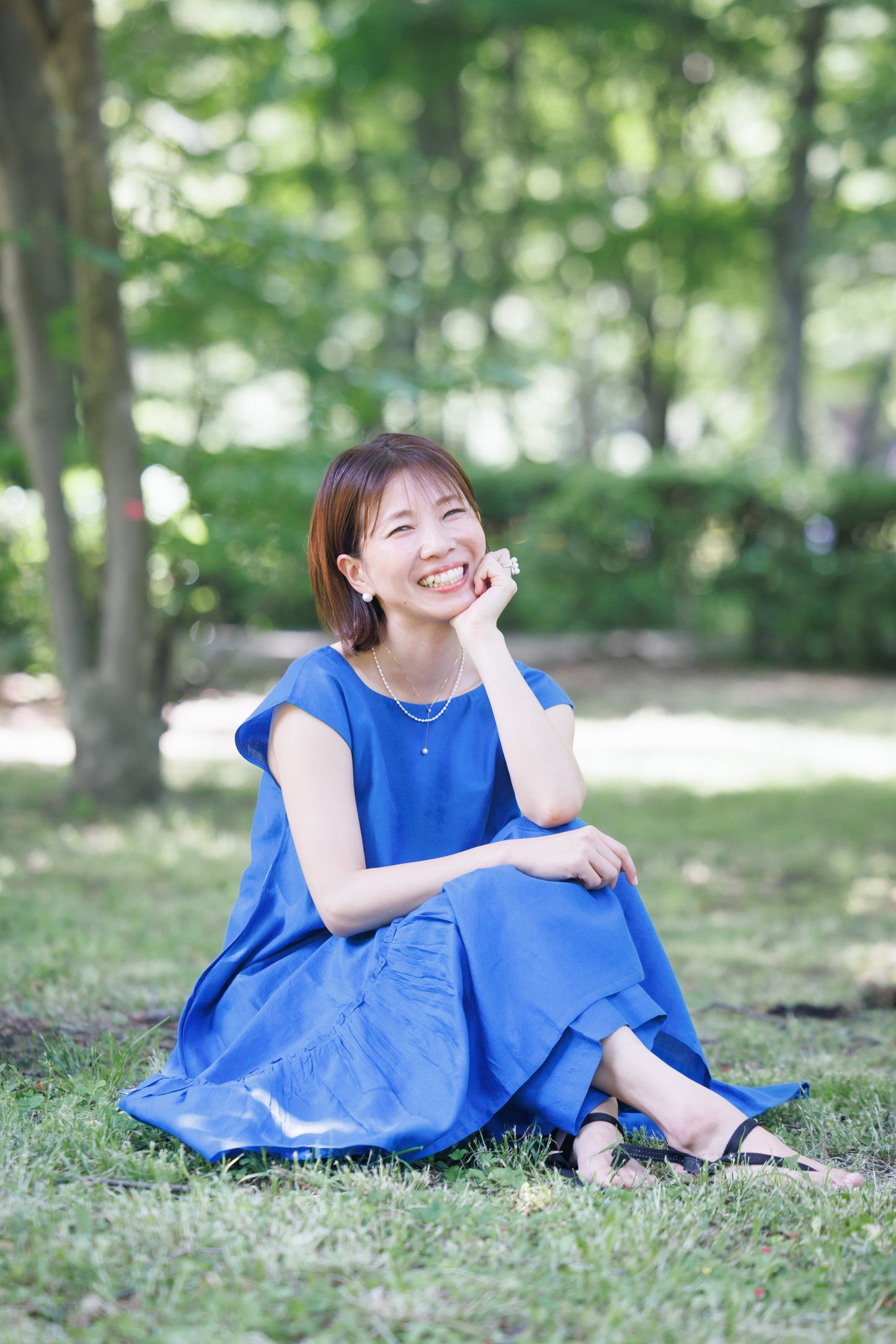bright blue shift dress with tier hem and scoop back