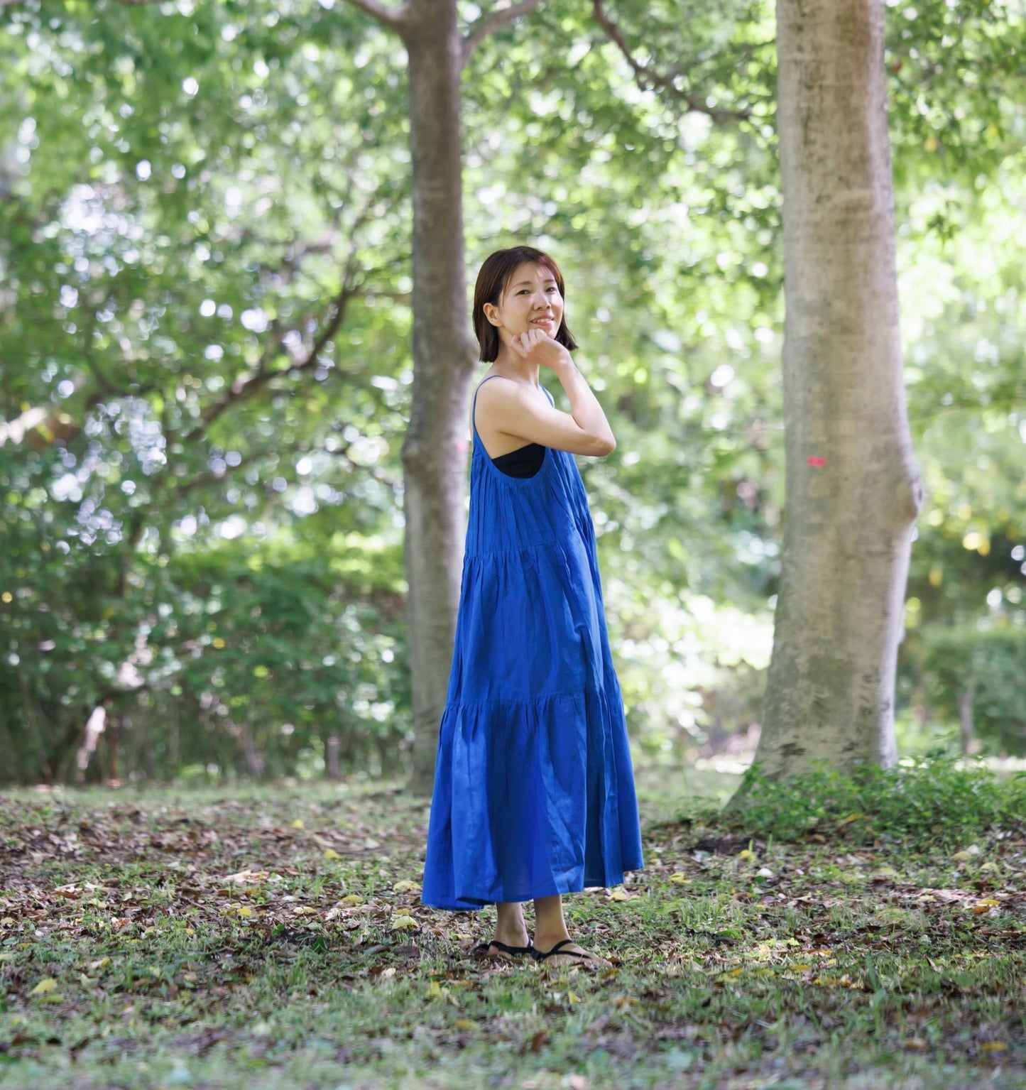 Blue three tier dress with comfortable straps and a very large fllare. 