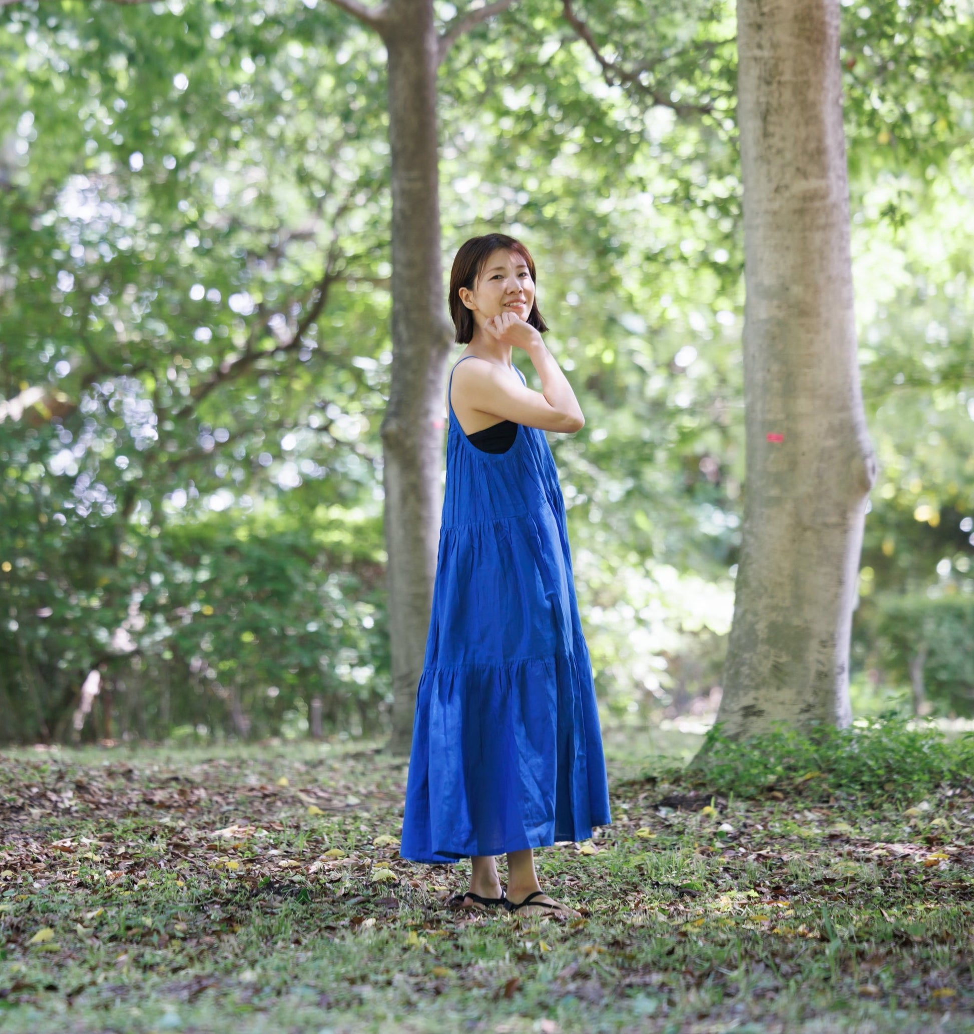 Blue three tier dress with comfortable straps and a very large fllare. 
