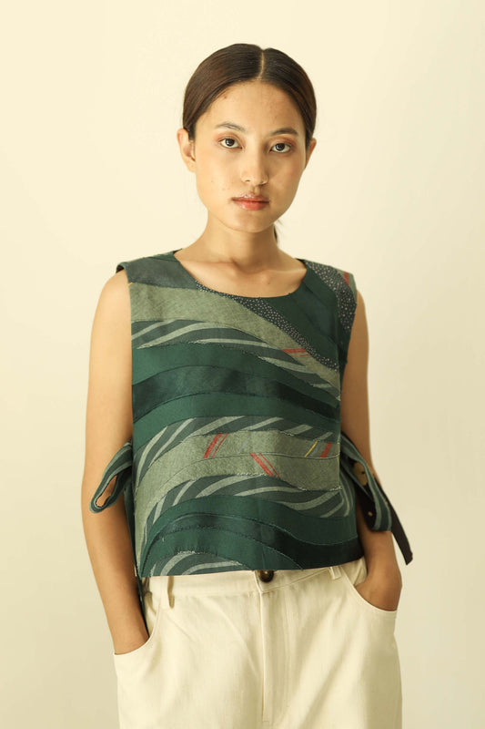 artist made one of a kind green patchwork overlay bib vest. available in japan. 