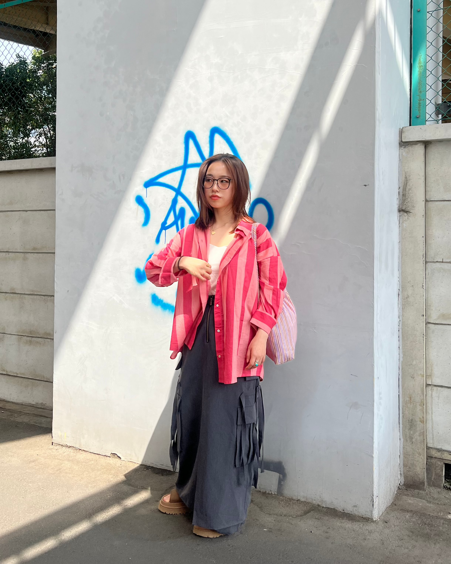 A oversized fit cotton shirt in broad pink stripes in two shades of pink 