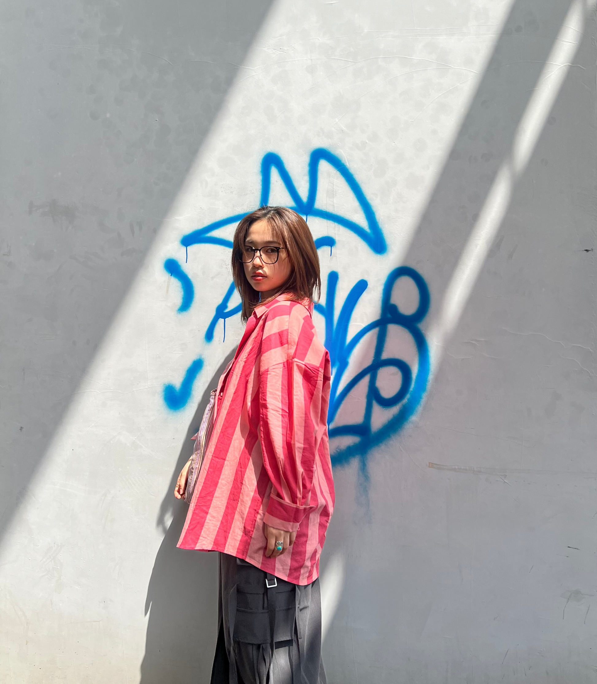 A oversized fit cotton shirt in broad pink stripes in two shades of pink 