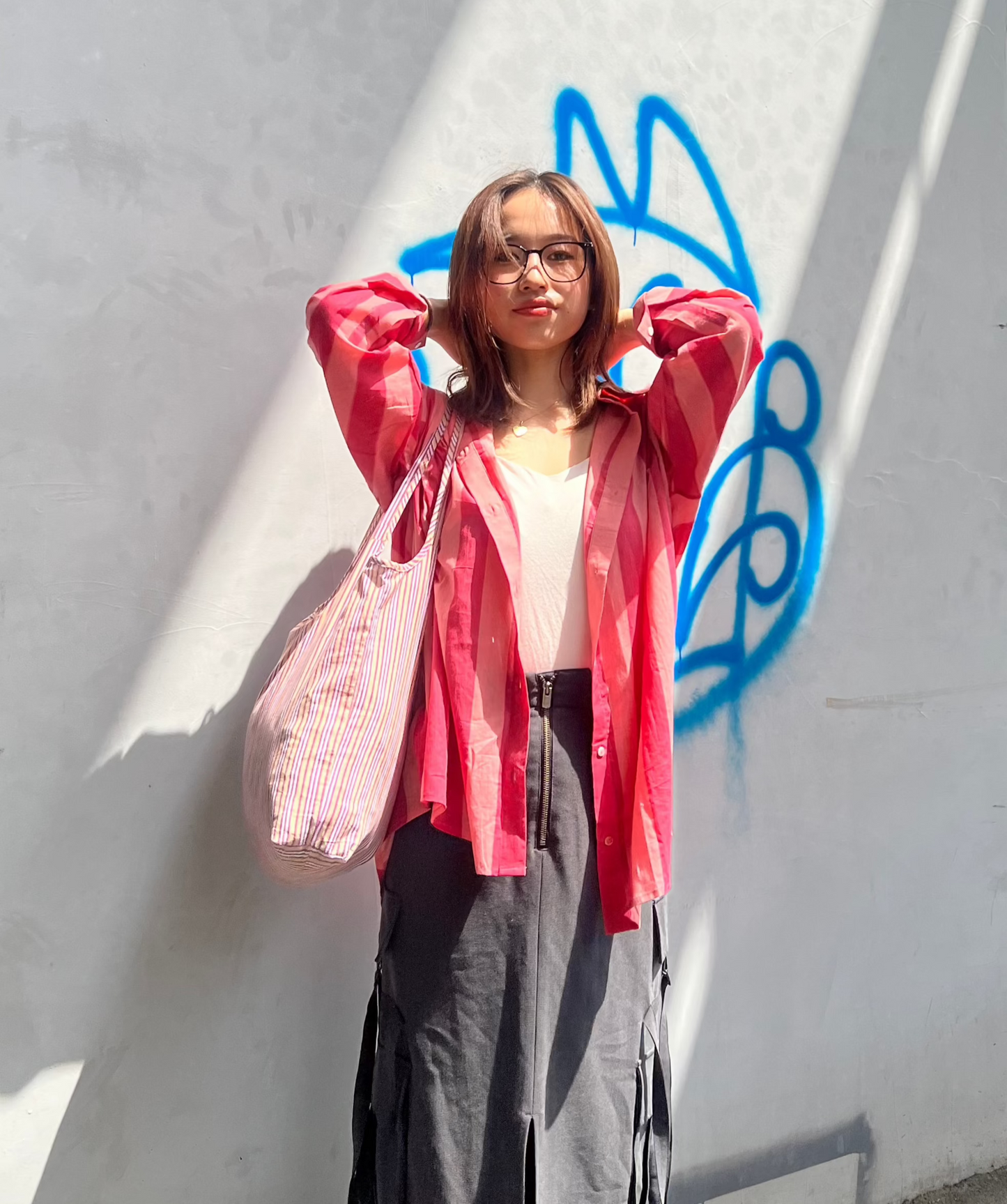 A oversized fit cotton shirt in broad pink stripes in two shades of pink 